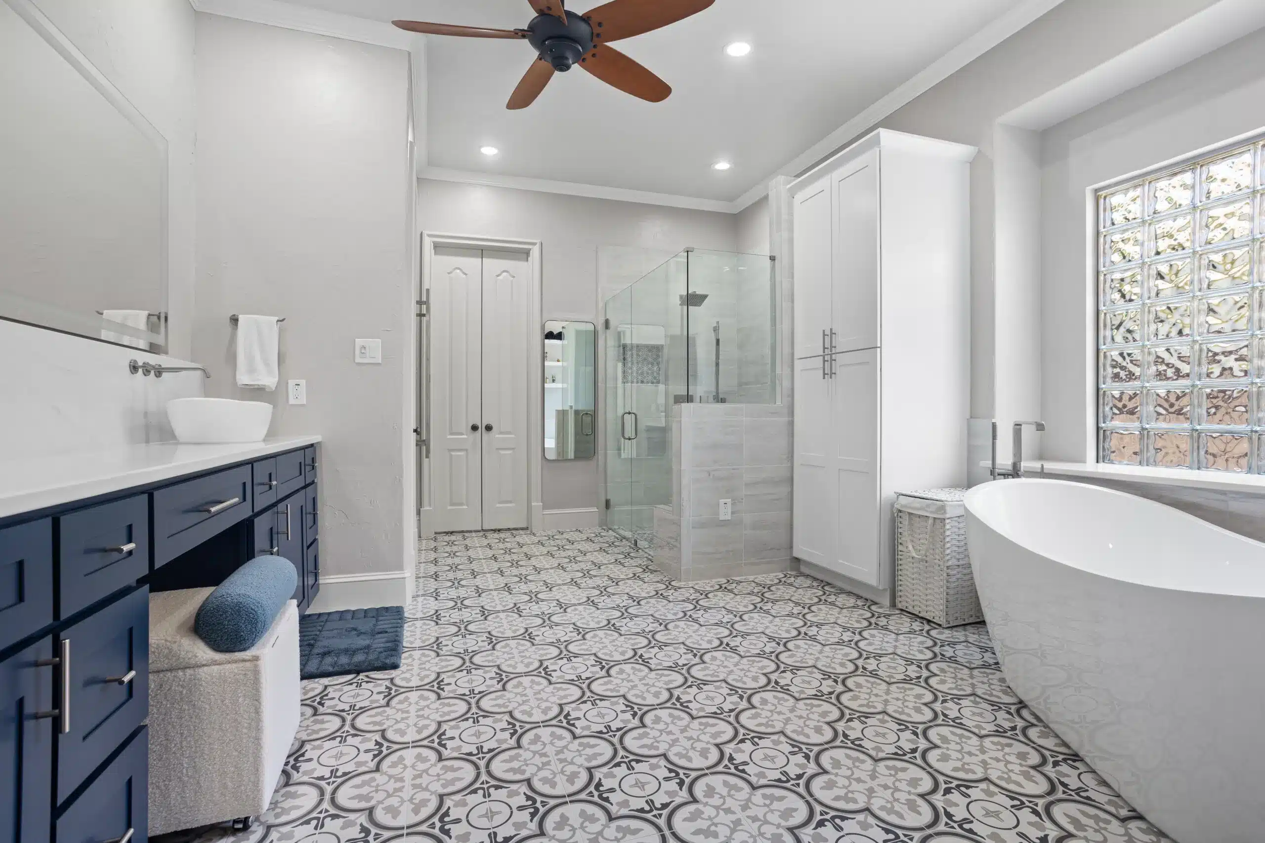 Kitchen and Bathroom Remodeling in Euless with a luxury bathroom renovation featuring a walk-in shower and custom vanity